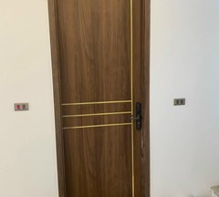 CỬA GỖ NHỰA TRANG TRÍ CHỈ NHÔM