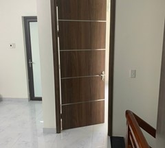 CỬA GỖ NHỰA TRANG TRÍ CHỈ NHÔM