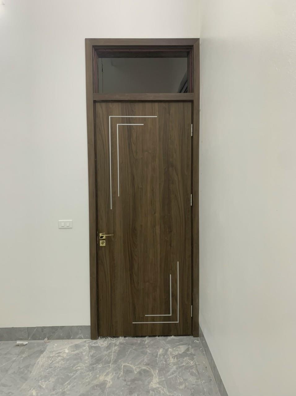 CỬA GỖ NHỰA TRANG TRÍ CHỈ NHÔM